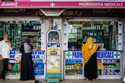 Two women at a pharmacy in India.